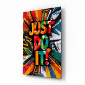 Just Do It pop-graffiti glass wall art in a modern home gym