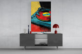 Pop turntable glass wall art catching light to reveal its halftone dots