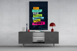 Do More Of What Makes You Happy glass wall art catching light to reveal its chalky edges