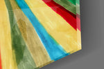 Close-up detail of the brushed rainbow rays and cream center behind glass