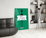 Alien panel against a saturated green-painted accent wall