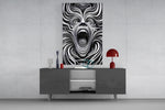 Spiral Scream glass wall art catching light to reveal its drawn precision