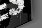 Close-up detail of the inked typography and detailed eye behind glass
