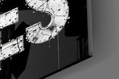 Close-up detail of the inked typography and detailed eye behind glass