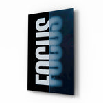 Focus split-typography glass wall art in a modern executive office