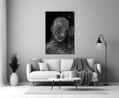Line-art glass print bringing reflective mood to a creative loft
