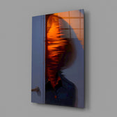 Glitch portrait panel anchoring a designer's office wall