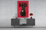Black Cat No Means No glass wall art catching light to reveal its bold typography