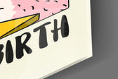Close-up detail of the pink llama with sunglasses and pearls behind glass