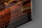 Close-up detail of the brass scale pans and mahogany desk on the glass surface