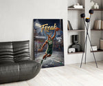freak antlered stag baller glass wall art leaning beside a dark leather sofa