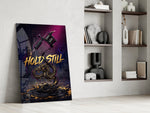 hold still tattoo machine and gold dragon panel resting in a shelving niche in a modern interior