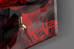Close-up detail of the gorilla's red boxing gloves raised in a spotlit ring on the glass surface