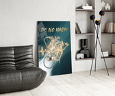 do no harm stethoscope and golden heart glass wall art leaning beside a dark leather sofa