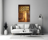 gold real estate key with a skyline panel bringing character to a minimalist living room wall