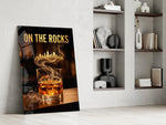 whiskey glass with a golden skyline panel resting in a shelving niche in a modern interior
