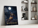 basketball player palming the moon panel resting in a shelving niche in a modern interior