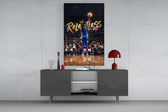 gold Relentless basketball jump shot glass wall art displayed above a console in a designer interior