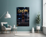 gold Queen basketball shooter glass wall art styled above an armchair in a reading corner