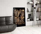 gold Dunk basketball typography glass wall art leaning beside a dark leather sofa