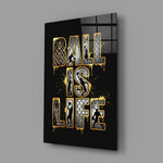gold Ball Is Life basketball typography glass wall art angled to show the polished tempered glass panel