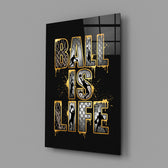 gold Ball Is Life basketball typography glass wall art angled to show the polished tempered glass panel