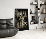gold Ball Is Life basketball typography glass wall art leaning beside a dark leather sofa