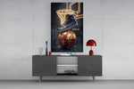 a high-top sneaker over a golden globe basketball glass wall art displayed above a console in a designer interior