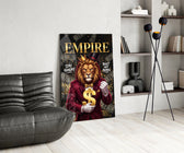 a crowned lion in a red suit holding a gold dollar sign glass wall art leaning beside a dark leather sofa