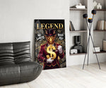 a golden dragon in a suit holding a gold dollar sign glass wall art leaning beside a dark leather sofa