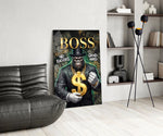 suited gorilla with a gold dollar sign glass wall art leaning beside a dark leather sofa
