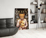 suited lioness with a gold dollar sign glass wall art leaning beside a dark leather sofa