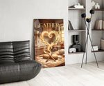 gather golden flour heart kitchen glass wall art leaning beside a dark leather sofa