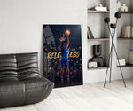 relentless basketball crown shot glass wall art leaning beside a dark leather sofa