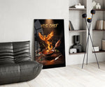 yes chef fire phoenix flaming pan glass wall art leaning beside a dark leather sofa