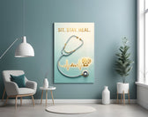 sit stay heal veterinary stethoscope glass wall art styled above an armchair in a reading corner