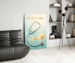 sit stay heal veterinary stethoscope glass wall art leaning beside a dark leather sofa