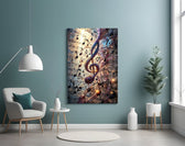 a glowing treble clef among music notes glass wall art styled above an armchair in a reading corner