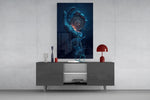 liquid water hand holding an ornate compass glass wall art displayed above a console in a designer interior