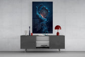 liquid water hand holding an ornate compass glass wall art displayed above a console in a designer interior
