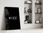 interlocking rich and risk typography panel resting in a shelving niche in a modern interior