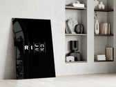 interlocking rich and risk typography panel resting in a shelving niche in a modern interior