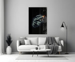 a serpent coiled around a firing pistol panel bringing character to a minimalist living room wall