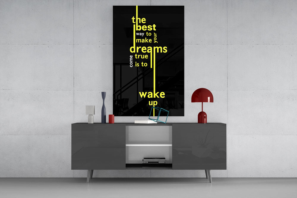 wake up dreams quote in yellow glass wall art displayed above a console in a designer interior