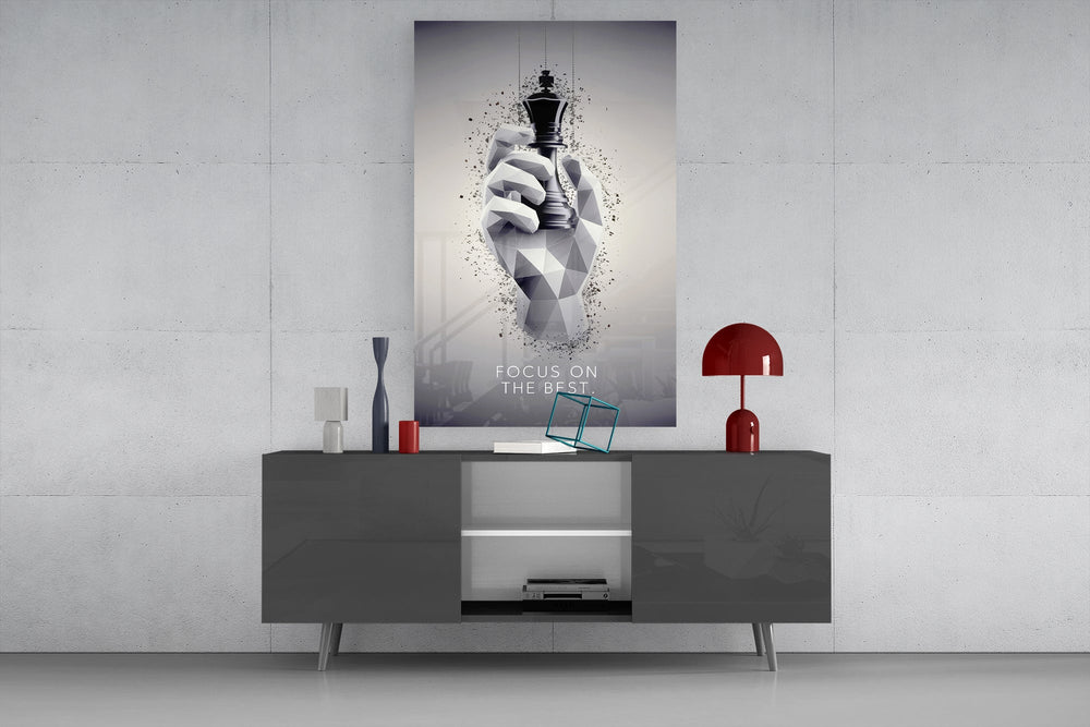 focus on the best chess king glass wall art displayed above a console in a designer interior
