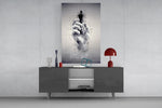 focus on the best chess king glass wall art displayed above a console in a designer interior