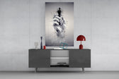 focus on the best chess king glass wall art displayed above a console in a designer interior