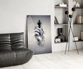 focus on the best chess king glass wall art leaning beside a dark leather sofa