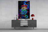 never give up neon graffiti quote glass wall art displayed above a console in a designer interior