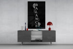 balance brain and heart quote glass wall art displayed above a console in a designer interior
